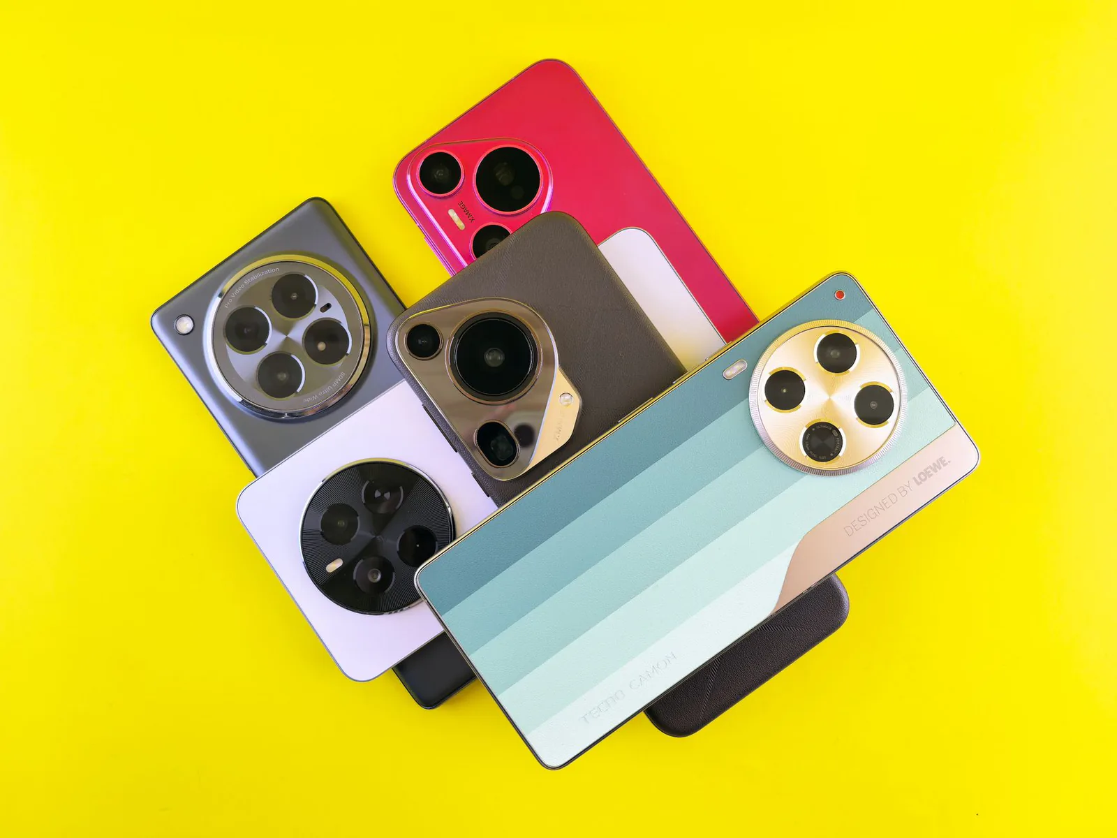 A collection of smartphones in many different colors on a bright background
