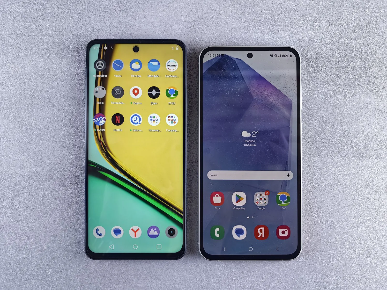 Top-down view of two modern smartphones side by side for comparison