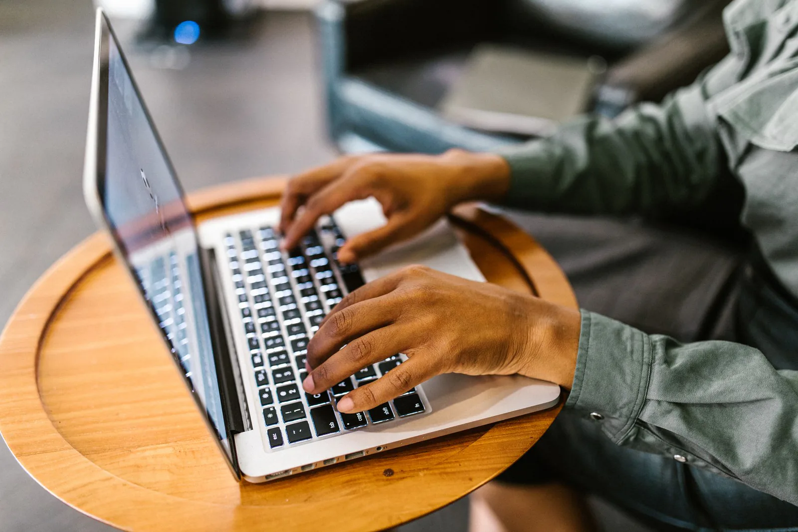 Freelancer working on laptop for small business accounting