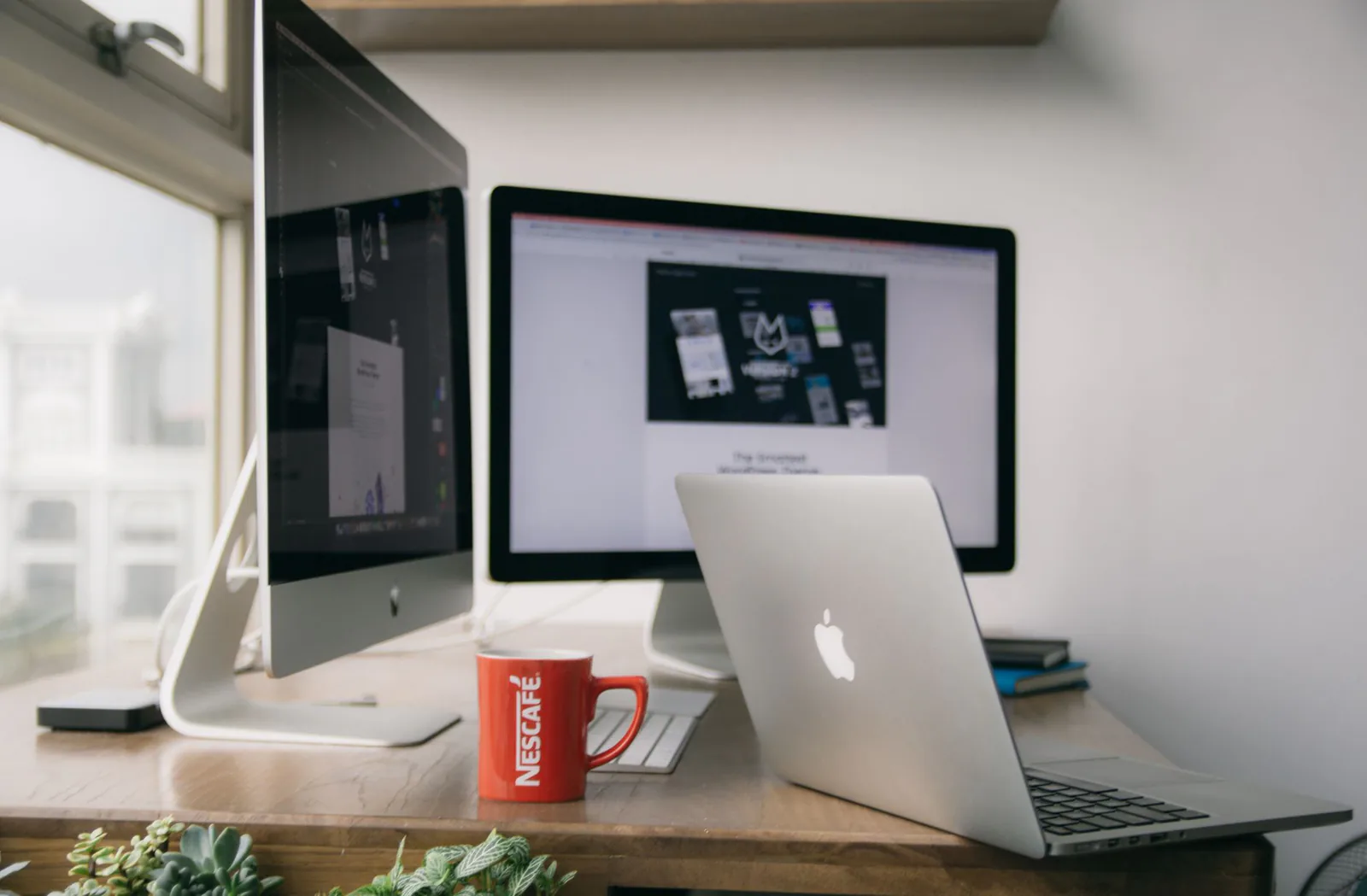 Website design workspace with computer