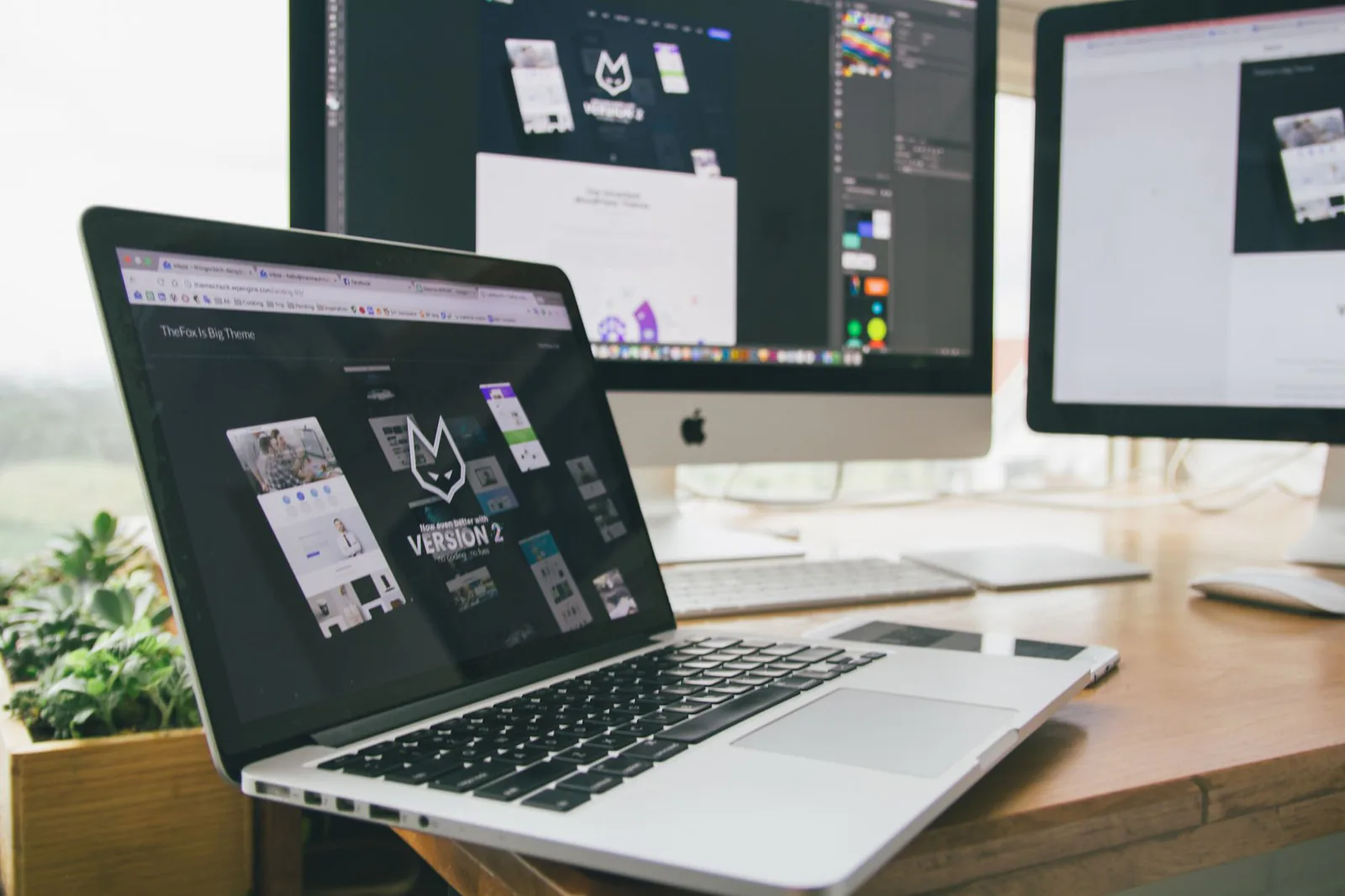 Website builder comparison on laptop screen