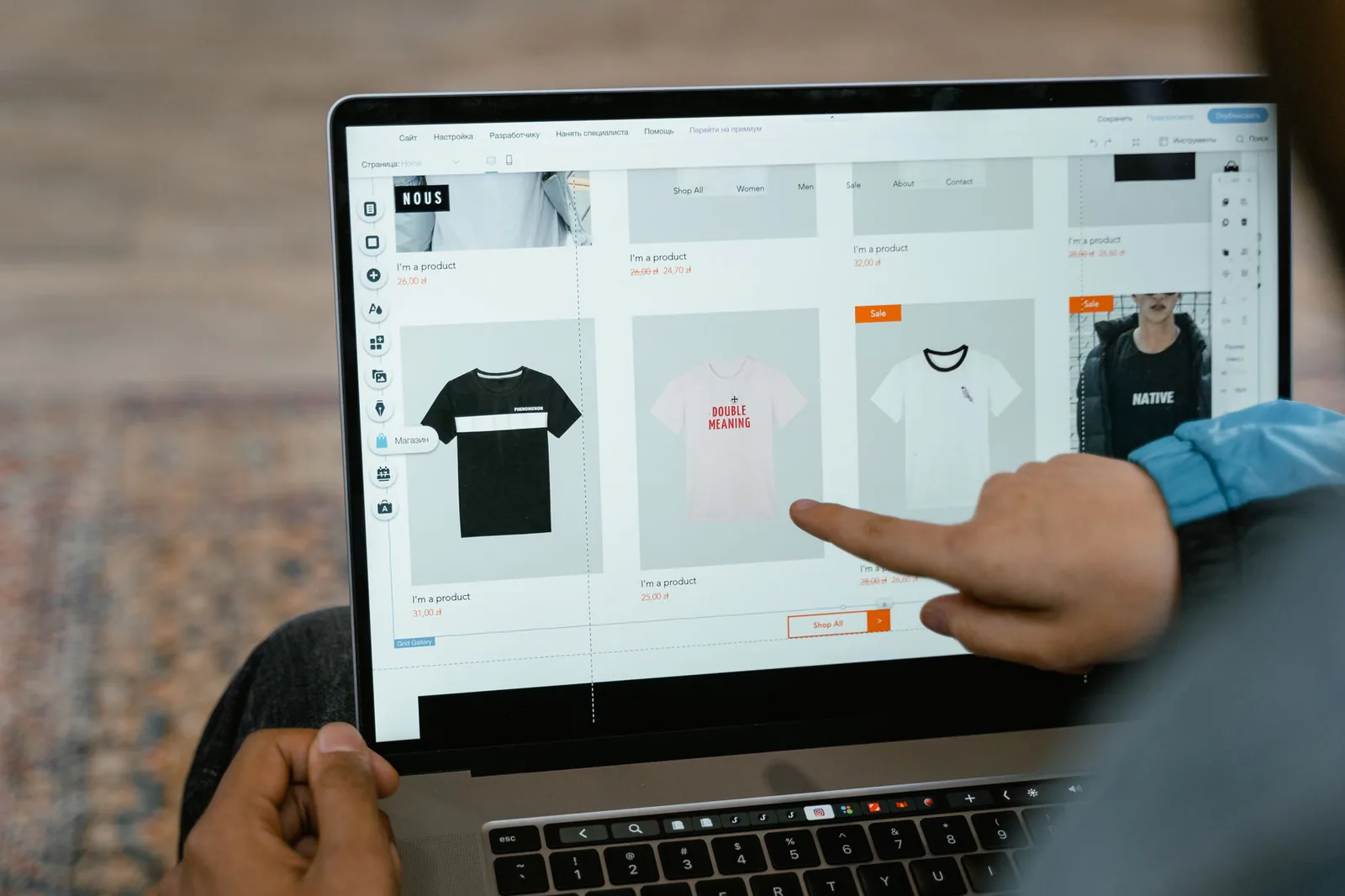 Person browsing an online store product catalog on a laptop