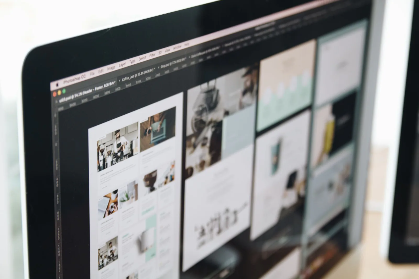 Web design workspace with modern computer monitors
